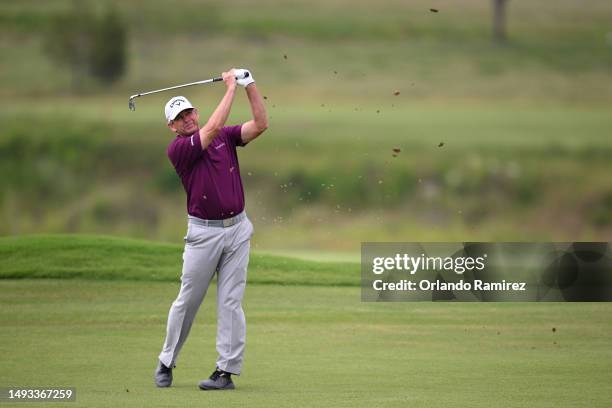 Lee Janzen plays a shot on the ninth hole during the first round of the KitchenAid Senior PGA Championship at Fields Ranch East at PGA Frisco on May...