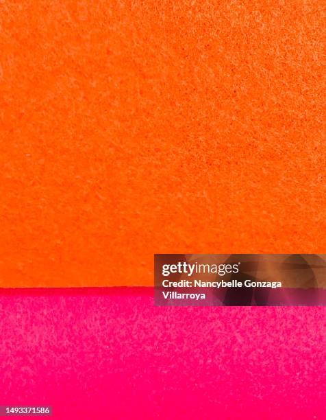 orange and hot pink felt textile - rosa brillante fotografías e imágenes de stock