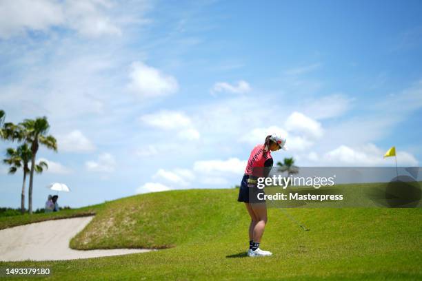 Rei Matsuda of Japan chips onto the 12th green during the second round of resorttrust Ladies at Grandy Hamanako Golf Club on May 26, 2023 in...