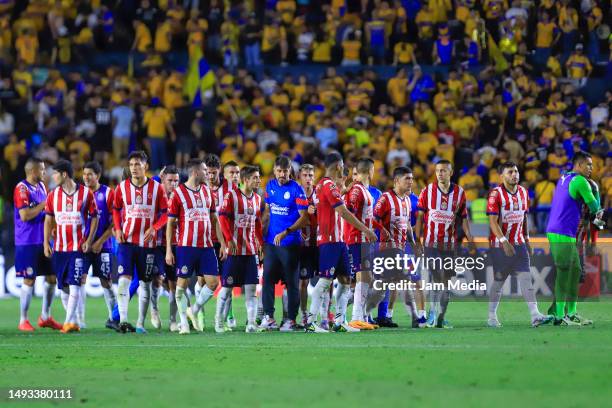 Veljko Paunovic , head coach of Chivas and his players walk during the final first leg match between Tigres UANL and Chivas as part of the Torneo...