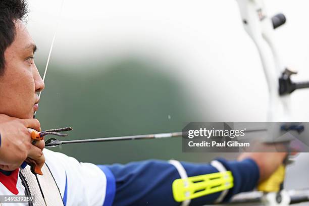 Yu Ishizu of Japan in action during the Archery Ranking Round on Olympics Opening Day as part of the London 2012 Olympic Games at the Lord's Cricket...