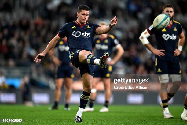 Freddie Burns of the Highlanders kicks for touch during the round 14 Super Rugby Pacific match between Highlanders and Queensland Reds at Forsyth...