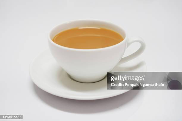 coffee cappuccino in cup on white background, drink beverage - teetasse stock-fotos und bilder