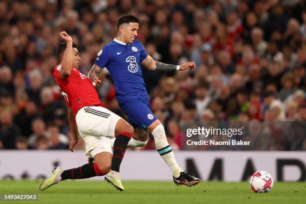 Enzo Fernandez of Chelsea collides Casemiro of Manchester United controls the ball during the Premier League match between Manchester United and...