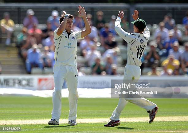 Chris Russell of Worcestershire celebrates taking the wicket of Jacques Rudolph of South Africa with team-mate Matthew Pardoe during the match...