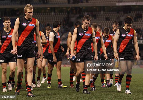 Bomber players walk of the ground after the round 18 AFL match between the Essendon Bombers and the Hawthorn Hawks at Etihad Stadium on July 27, 2012...