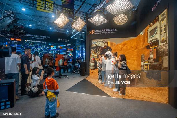 Visitors experience VR technology during the China International Big Data Industry Expo 2023 on May 26, 2023 in Guiyang, Guizhou Province of China....