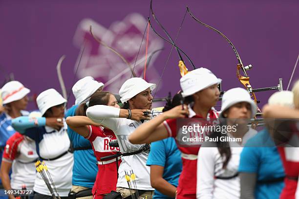 Competitors in action during the Archery Ranking Round on Olympics Opening Day as part of the London 2012 Olympic Games at the Lord's Cricket Ground...