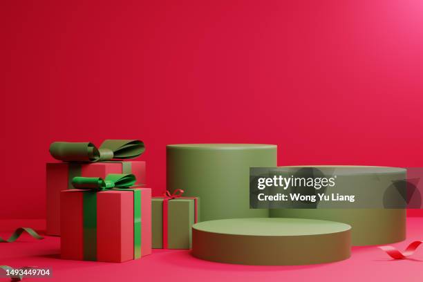 christmas presents with podium - red pedestal stock pictures, royalty-free photos & images