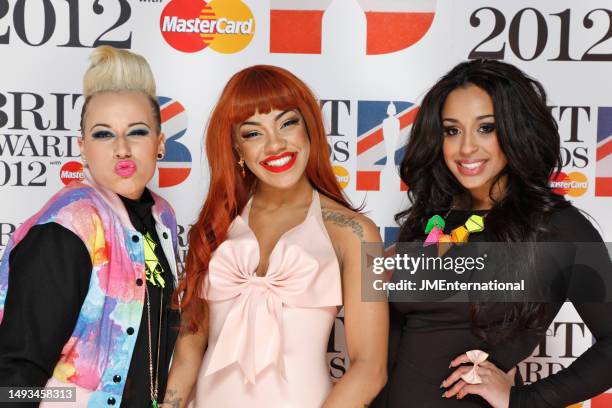 Stooshe attend The BRIT Awards 2012 at The O2, on February 21, 2012 in London, England. L-R Courtney Rumbold, Karis Anderson, Alexandra Buggs.