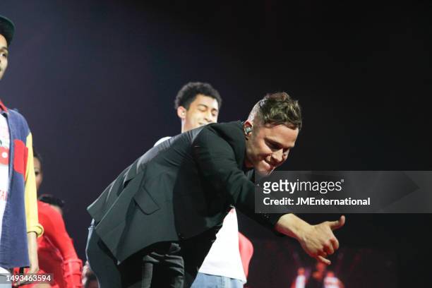 Rizzle Kicks and Olly Murs perform on stage during The BRIT Awards 2012 at The O2, on February 21, 2012 in London, England.