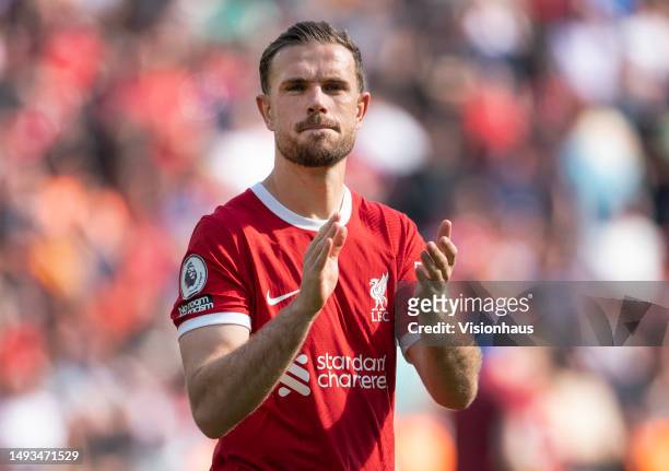 Jordan Henderson of Liverpool applauds the fans after the Premier League match between Liverpool FC and Aston Villa at Anfield on May 20, 2023 in...