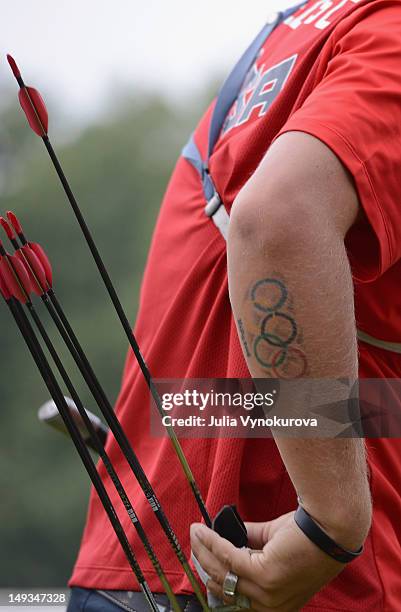 Brady Ellison of the United States prepares to shoot during the Archery Ranking Round on the Opening Day of the London 2012 Olympic Games at Lord's...