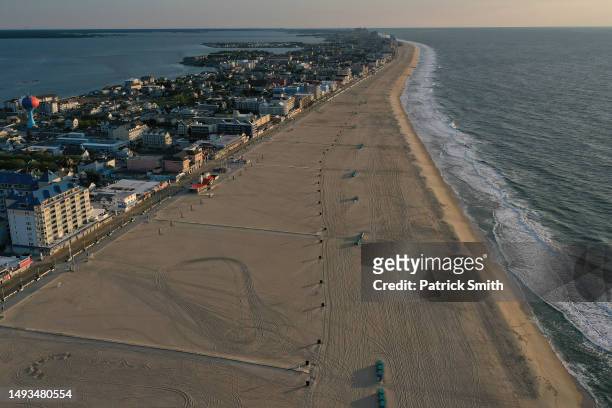 In an aerial view, the Ocean City inlet and Ocean City boardwalk is seen on May 26, 2023 in Ocean City, Maryland. Memorial Day Weekend marks the...