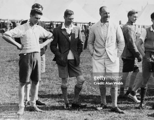 Prince Albert, Duke of York smiles with boys of the Duke of York's Boys' Camp, Southwold, Suffolk, August 5th, 1936.