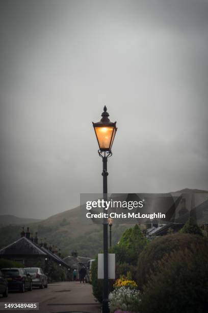 street light at luss - street light lamp stock pictures, royalty-free photos & images