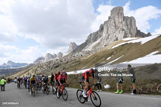 Geraint Thomas of The United Kingdom- Pink Leader Jersey and Laurens De Plus of Belgium and Team INEOS Grenadiers lead the peloton at the Passo Giau...