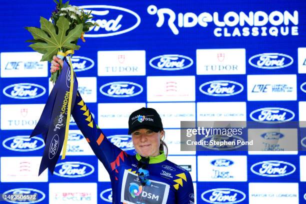 Charlotte Kool of The Netherlands and Team DSM celebrates at podium as Blue Leader Jersey winner during the 6th RideLondon Classique 2023, Stage 1 a...