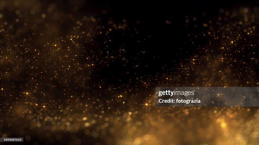 Golden Blurred Particles. Copy Space
