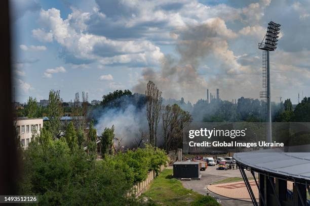 Smoke from the fire rises above a hospital hit by a Russian missile on May 26, 2023 in Dnipro, Ukraine. On the morning of May 26, the Russian army...