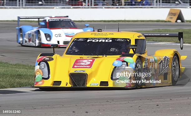 Jim Lowe and Paul Tracy, drivers of the M&M's Snack Mix/Speedway during practice for the Grand-Am Rolex Sports Car Series inagural Brickyard Grand...