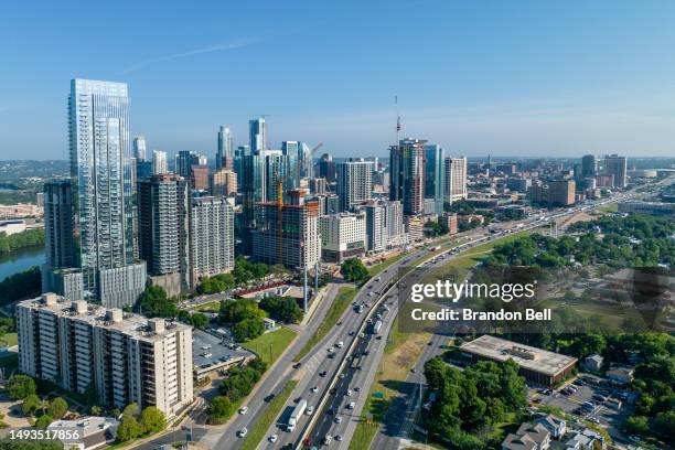 In an aerial view, traffic is seen traversing near downtown on May 26, 2023 in Austin, Texas. Millions of Americans are expected to travel this...