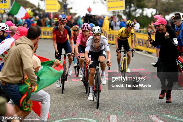 Geraint Thomas of The United Kingdom and Team INEOS Grenadiers - Pink Leader Jersey and João Almeida of Portugal and UAE Team Emirates - White Best...