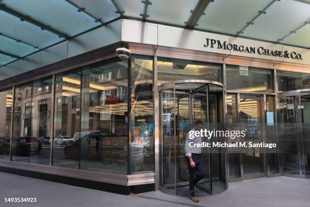 People pass the JPMorgan Chase headquarters building on May 26, 2023 in New York City. JPMorgan Chase chief executive Jamie Dimon is set to be...