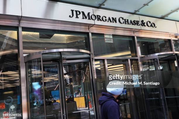 People pass the JPMorgan Chase headquarters building on May 26, 2023 in New York City. JPMorgan Chase chief executive Jamie Dimon is set to be...