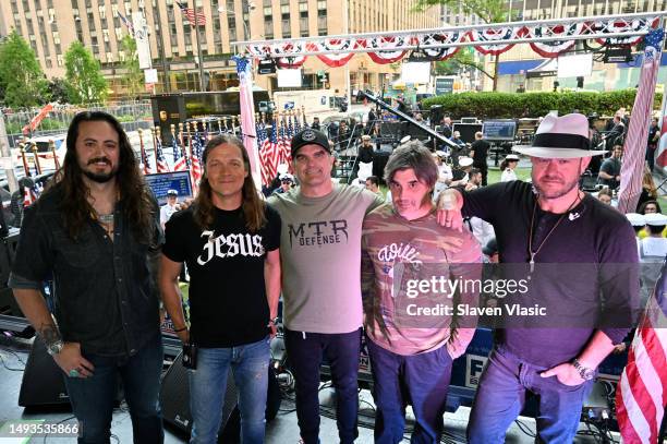 Justin Biltonen, Brad Arnold, Chris Henderson, Greg Upchurch and Chet Roberts of 3 Doors Down pose for photo at 2023 FOX & Friends' Summer Concert...