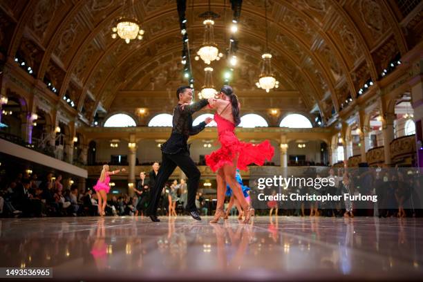 Dancers take to the dance floor as they show their skills to impress the judges and hope to advance to the next heat during the Blackpool Dance...
