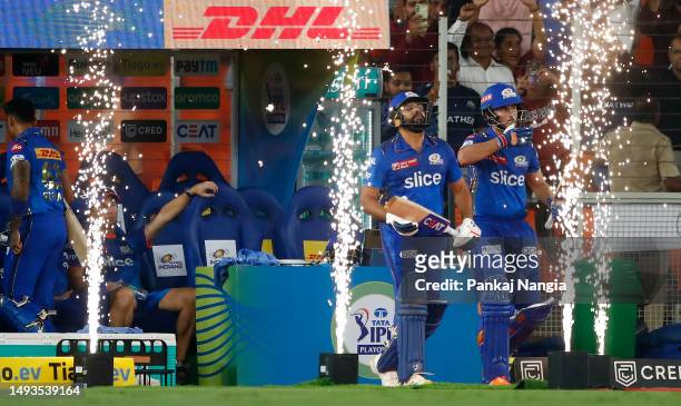 Rohit Sharma of Mumbai Indians and Nehal Wadhera walk onto the pitch before batting during the IPL Qualifier match between Gujarat Titans and Mumbai...