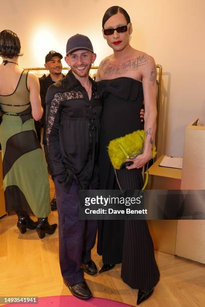 Patrick McDowell and Kyle De'Volle attend the Pinko x Patrick McDowell Cocktail in Celebration of Chelsea in Bloom at PINKO London on May 26, 2023 in...