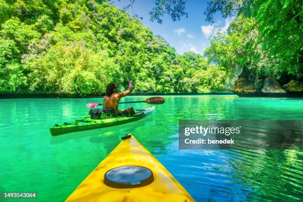 palau rock islands kayak adventure pacific - micronesia stock pictures, royalty-free photos & images