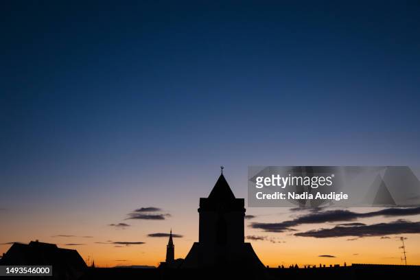 strasbourg cityscape silhouette with notre dame cathedral - christian audigie stock pictures, royalty-free photos & images