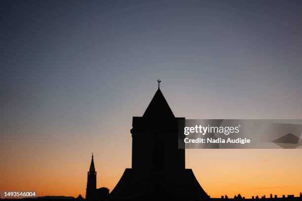 strasbourg cityscape silhouette with notre dame cathedral - christian audigie stock pictures, royalty-free photos & images