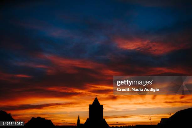 strasbourg cityscape silhouette with notre dame cathedral - christian audigie stock pictures, royalty-free photos & images