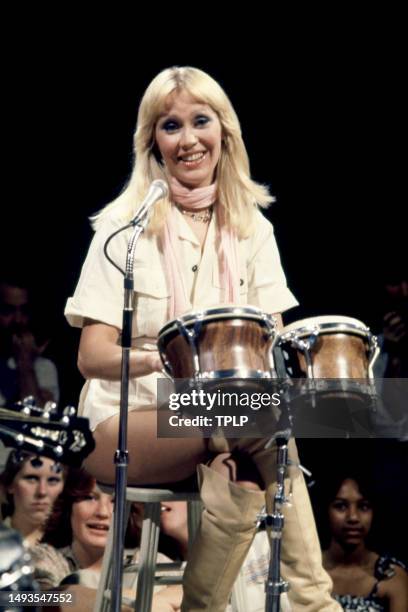 Swedish singer and songwriter Agnetha Fältskog, of the supergroup ABBA, performs on stage with bongo drums during the Olivia! TV Special at The...