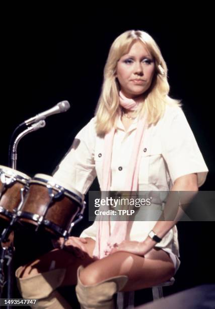 Swedish singer and songwriter Agnetha Fältskog, of the supergroup ABBA, performs on stage with bongo drums during the Olivia! TV Special at The...