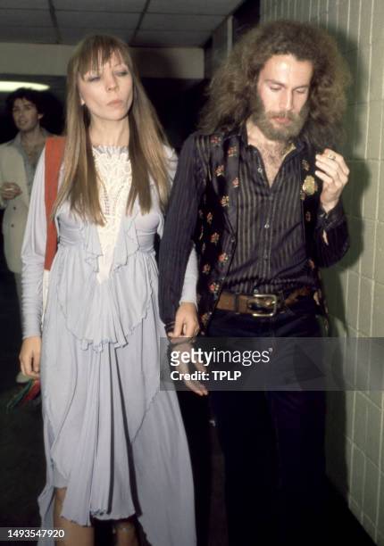 English fashion model Penelope Tree and her date attend Sly Stone's concert and onstage wedding, to Kathy Silva, at Madison Square Garden in New...