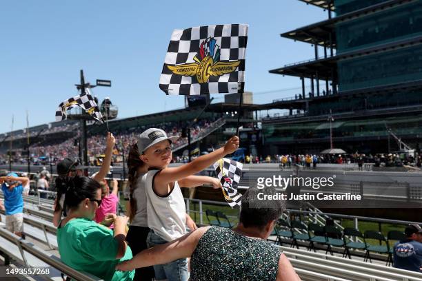 Fans cheer on drives during practice at Carb Day for the 107th Indianapolis 500 at Indianapolis Motor Speedway on May 26, 2023 in Indianapolis,...