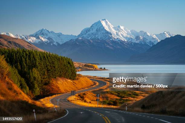 scenic view of snowcapped mountains against clear blue sky,canterbury,new zealand - new zealand landscape stock pictures, royalty-free photos & images