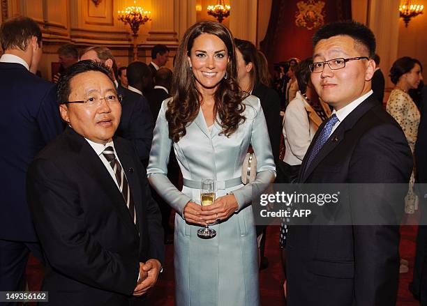 Catherine , Duchess of Cambridge, poses with President of Mongolia Elbegdorj Tsakhia during a reception at Buckingham Palace to welcome Heads of...