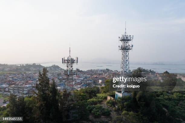 5g signal tower on the seaside hill - 5g wireless tower stock pictures, royalty-free photos & images