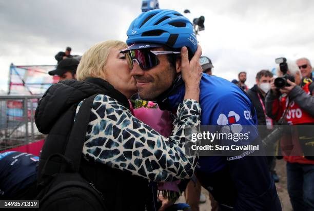 Thibaut Pinot of France and Team Groupama - FDJ - Blue Mountain Jersey receives a kiss from his mother during the 106th Giro d'Italia 2023, Stage 19...