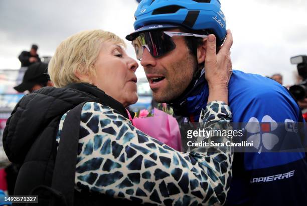 Thibaut Pinot of France and Team Groupama - FDJ - Blue Mountain Jersey receives a kiss from his mother during the 106th Giro d'Italia 2023, Stage 19...