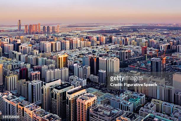 abu dhabi - east view - abu dhabi skyline stock pictures, royalty-free photos & images
