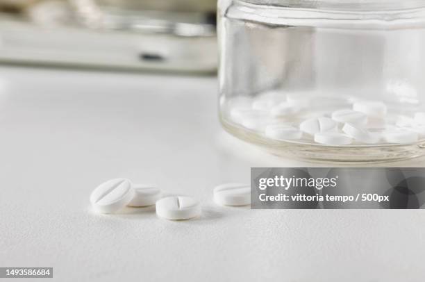 close-up of medicines on table,rome,metropolitan city of rome capital,italy - tempo supplementare stock pictures, royalty-free photos & images