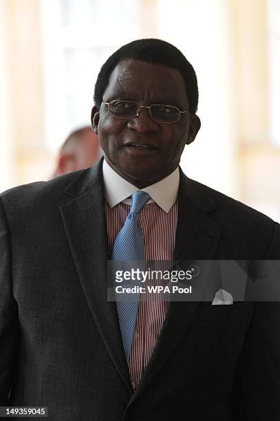 Richard Banda, First Gentleman of Malawi, arrives for a London 2012 Olympic Games reception, hosted by Britain's Queen Elizabeth II, at Buckingham...