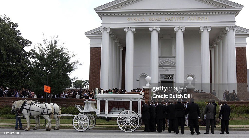Family and friends watch as the casket of Kile Glover is carried out Family and friends watch as the casket of Kile Glover is carried out